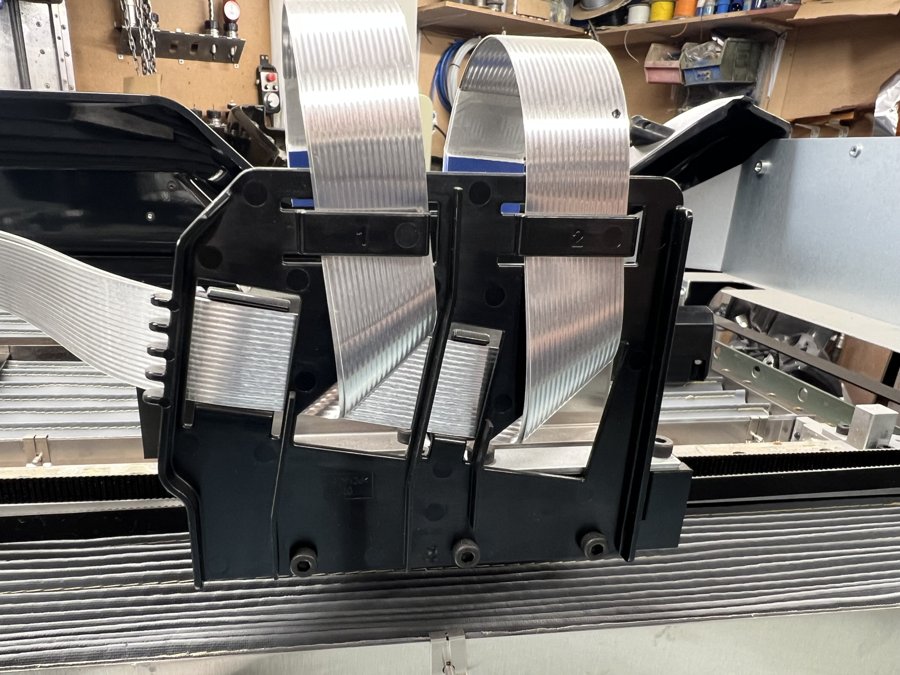 The backs of the installed heads and their ribbon cables.
